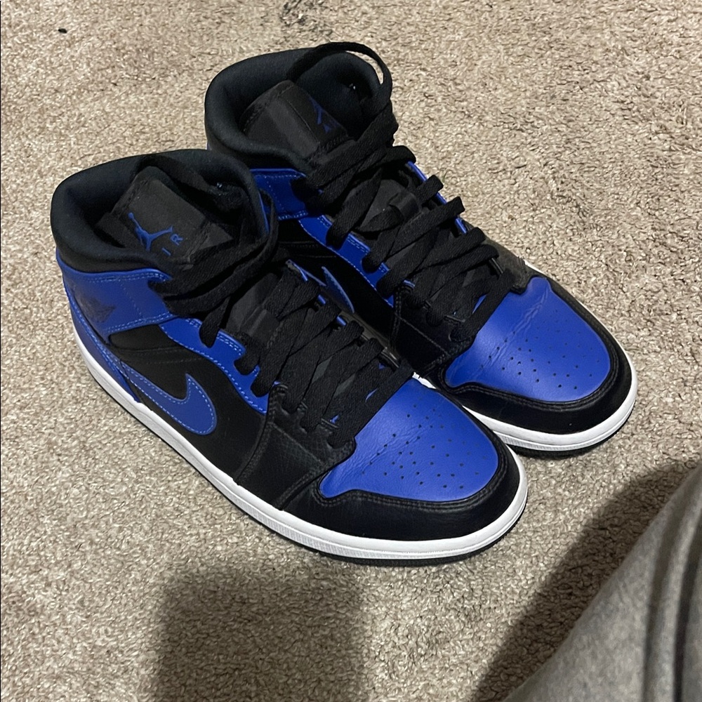 Jordan 1 Men’s Black and Blue Sneakers